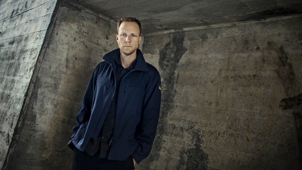 Journalisten Bo-Göran Bodin fotograferad under S:t Eriksbron.